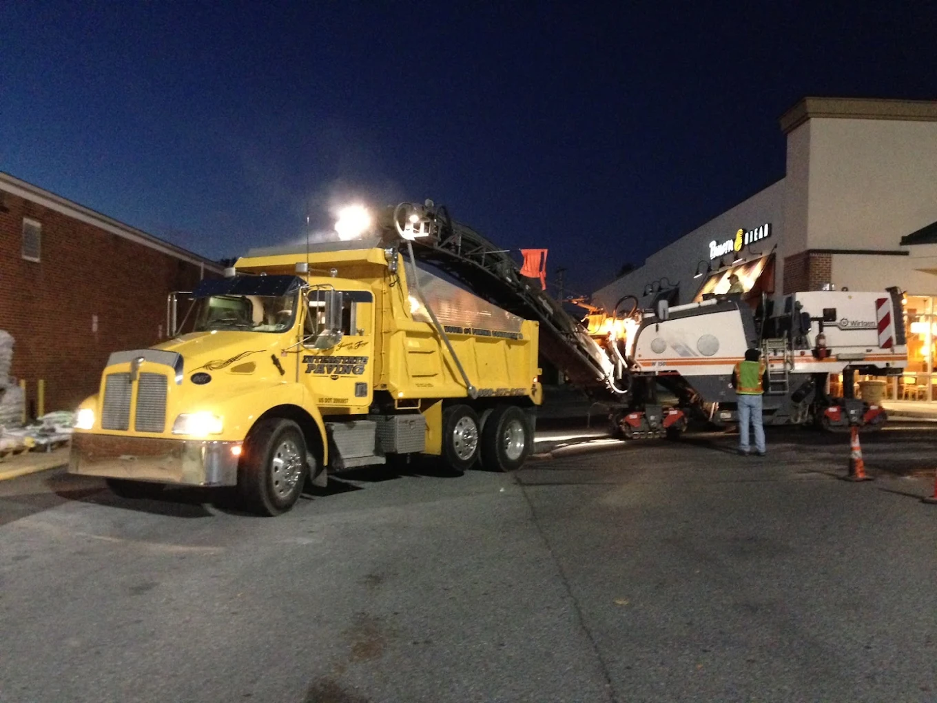 yellow paving truck